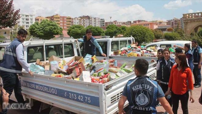 Kızıltepe´de bir markette tarihi geçmiş 2 kamyonet gıda ele geçirildi