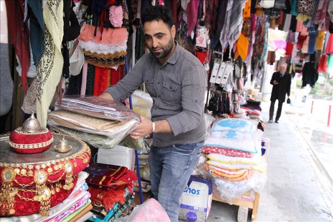 Suriyeli mülteci Macit 50 esnafa gönüllü çıraklık yapıyor