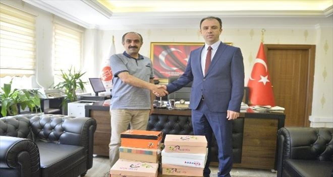 Mardin´de davalı taraflar, ihtiyaç sahibi öğrencilere ayakkabı alarak uzlaştı