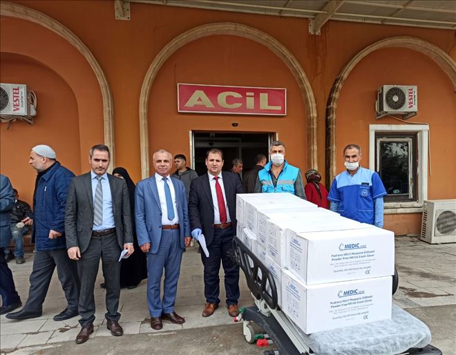 Büyükşehir Belediyesinden eldiven ve maske dağıtımı